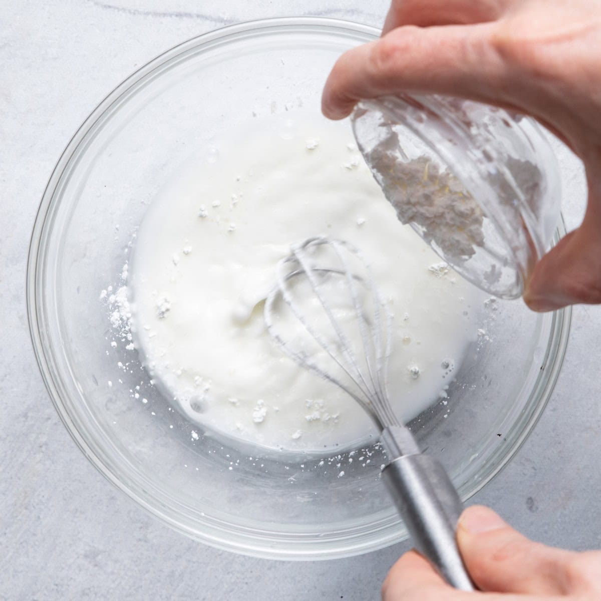 Whisked cornstarch and water in a small bowl.