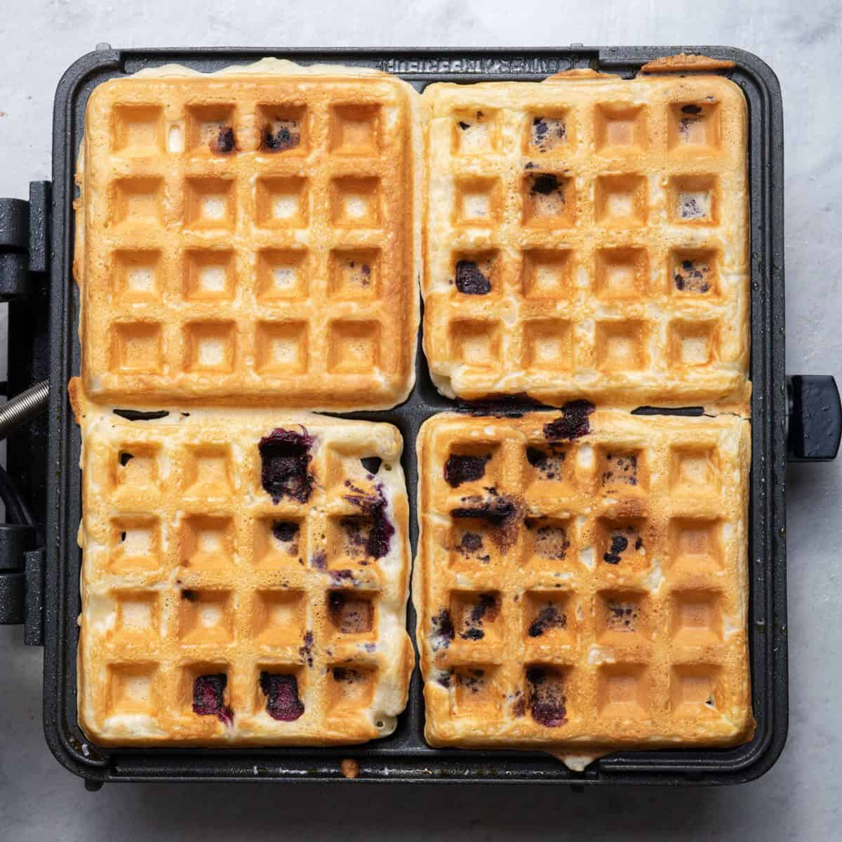 Batter in waffle iron after cooked.