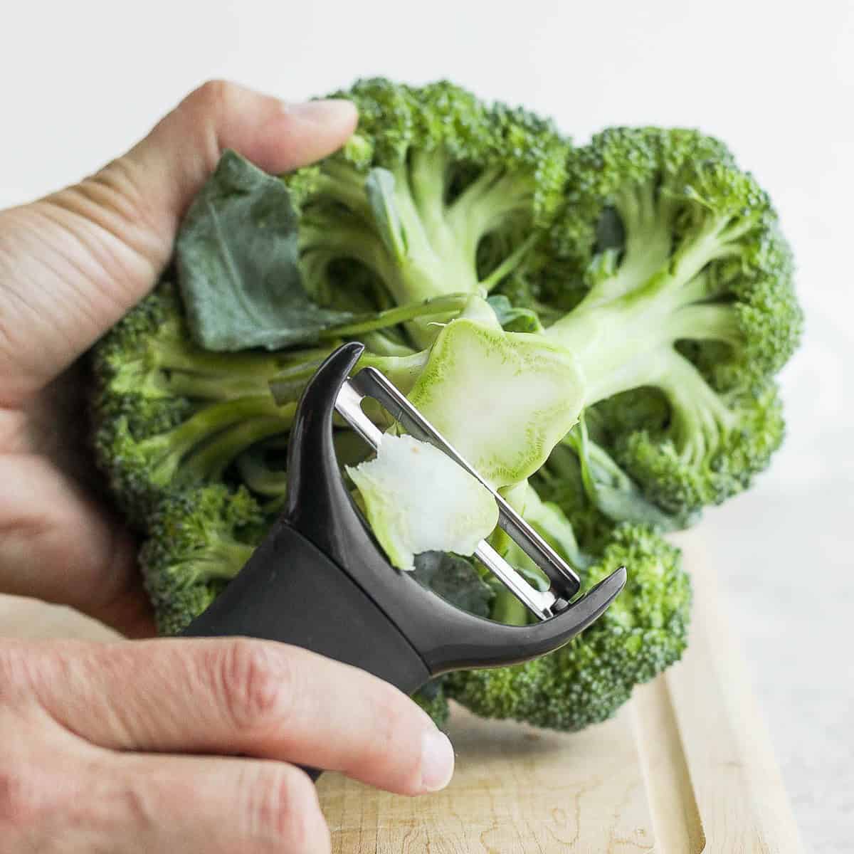 Peeling stem of broccoli.
