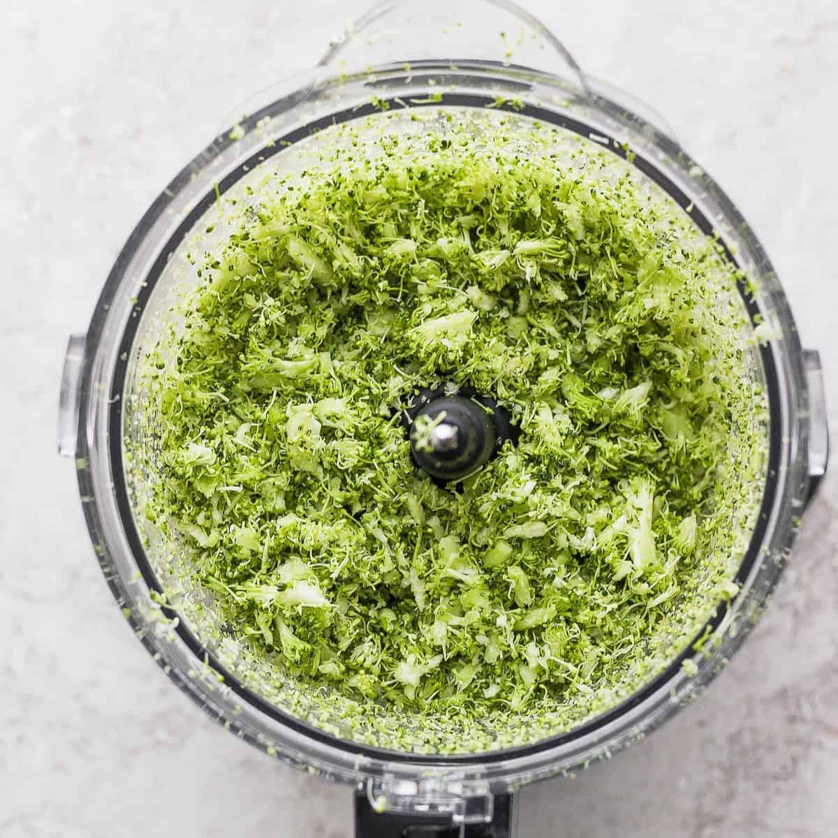 Broccoli florets in food process after processing.