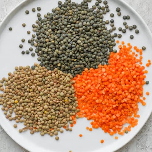 Plate showing three types of lentils: brown, red and green