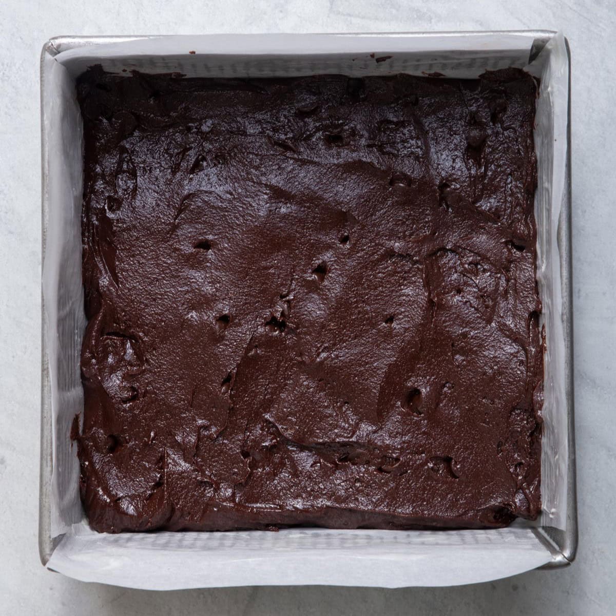 Batter in baking pan before baking.