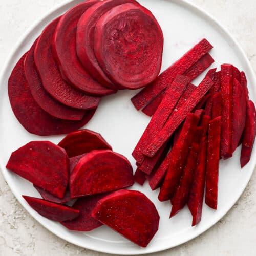 White plate with three types of cut beets