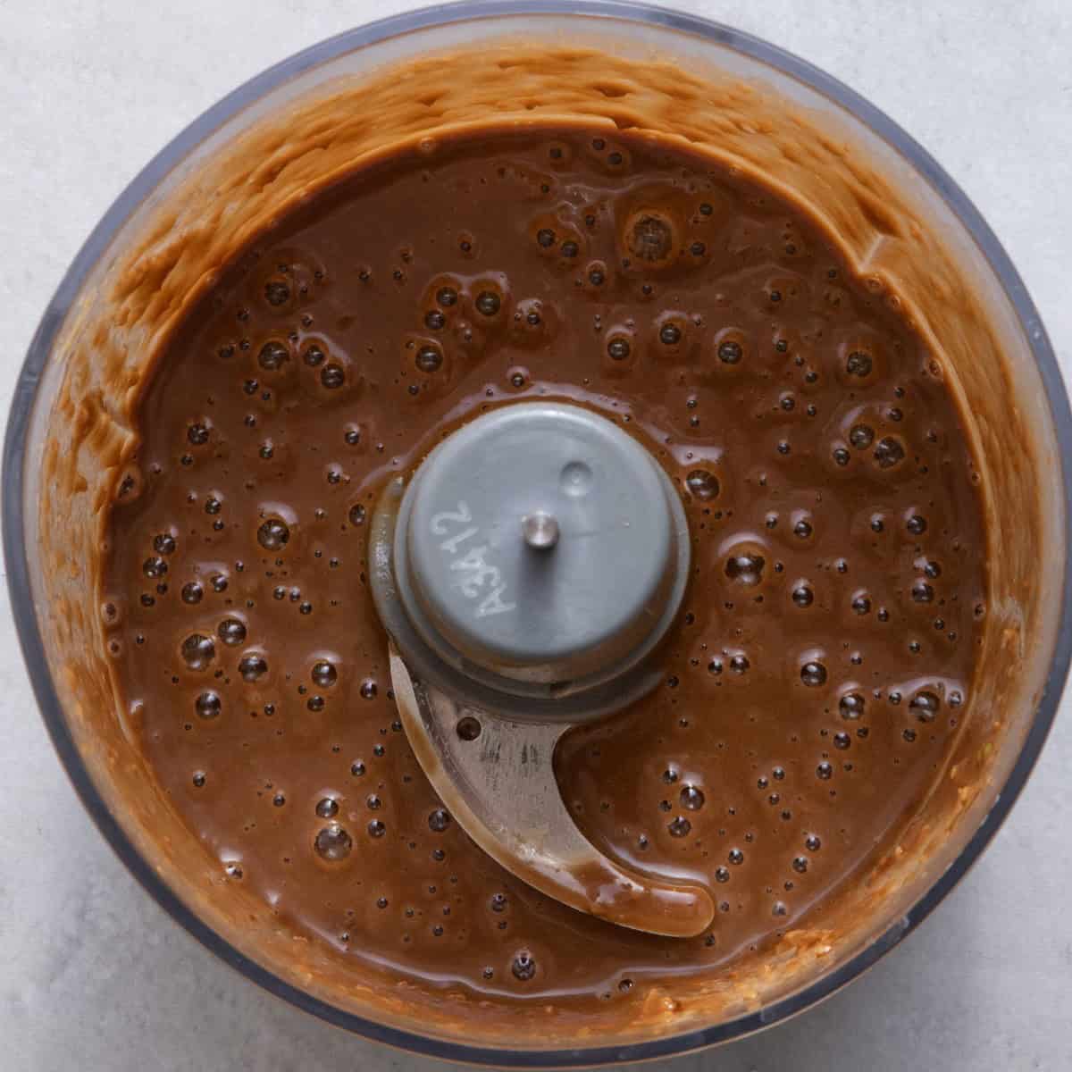 Dressing in food processor after blending.