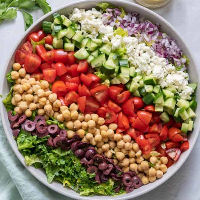 Mediterranean chopped salad assembled in a serving bowl.