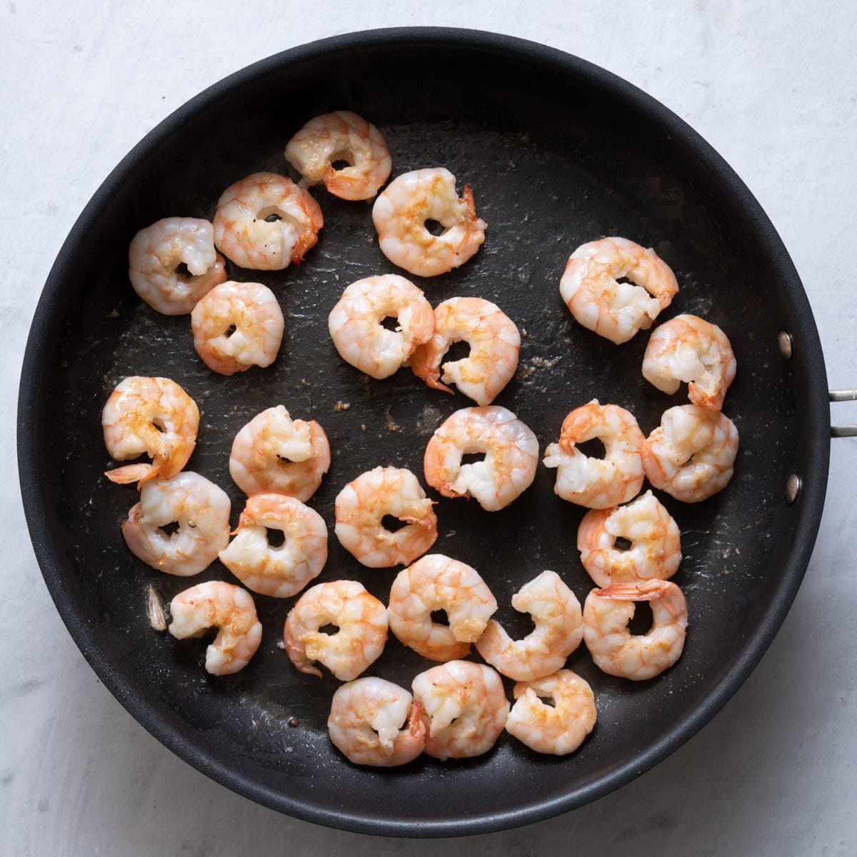 Shrimp on skillet after cooked.