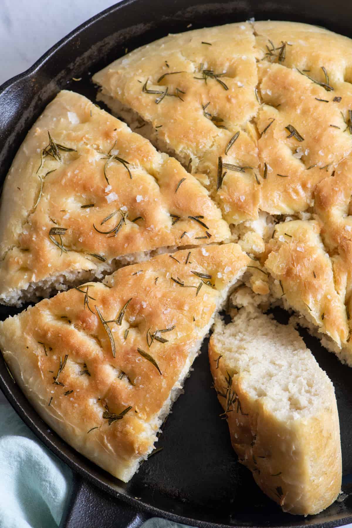 Recipe cooked in skillet with one piece turned on side.