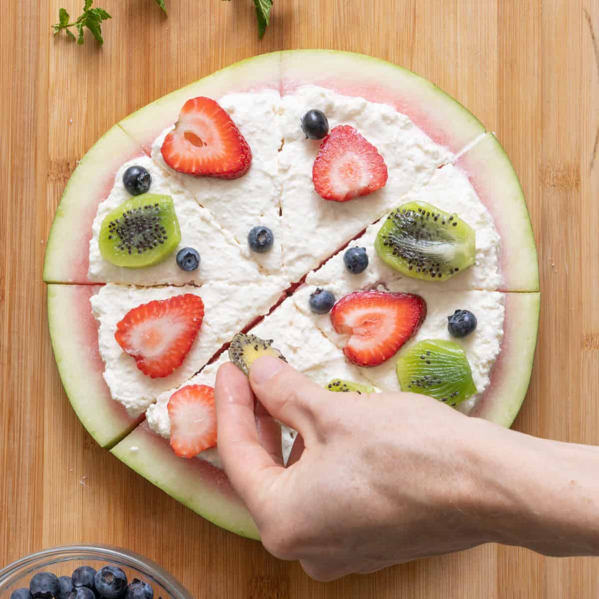 Add one of the fruits.