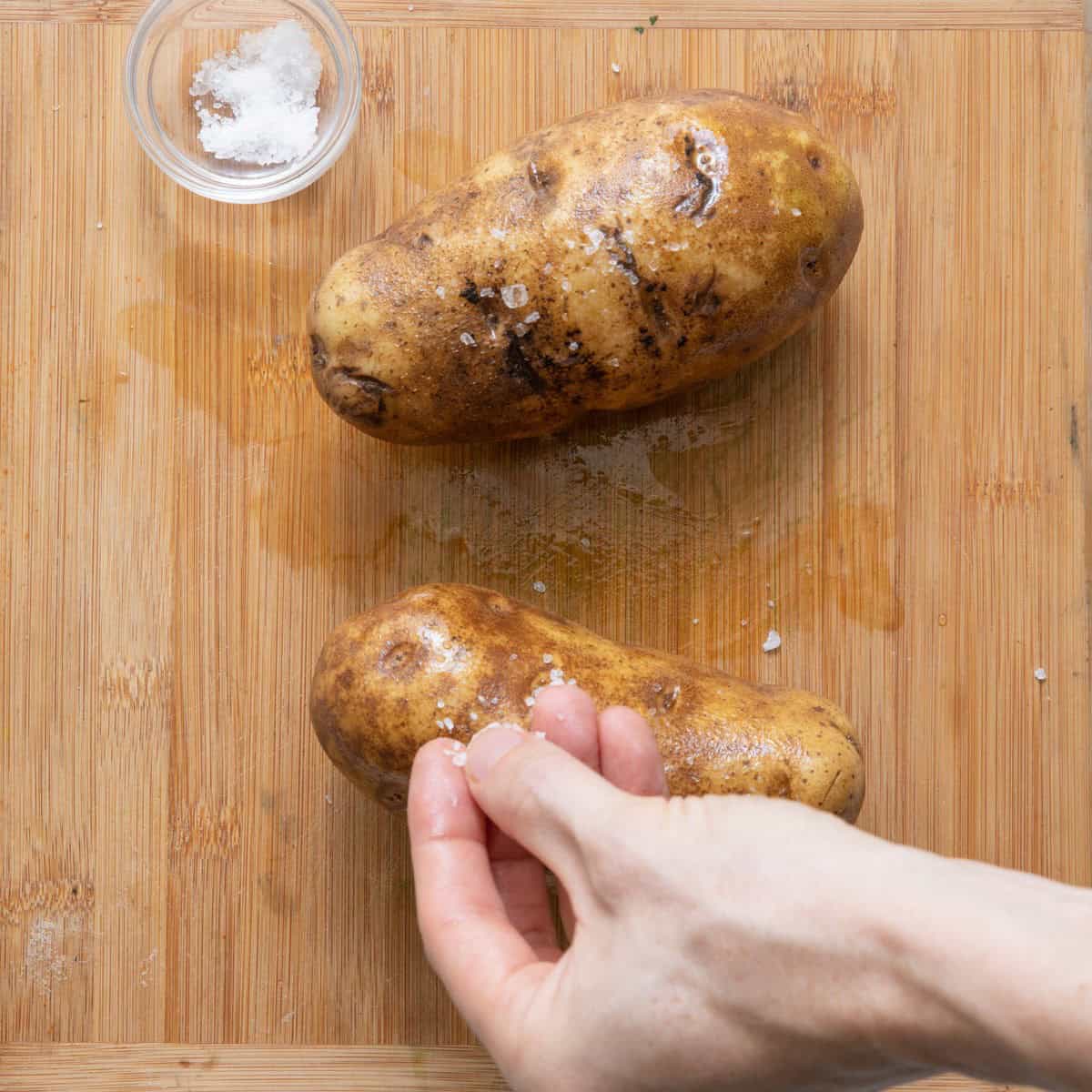 Sprinkled salt on potatoes.