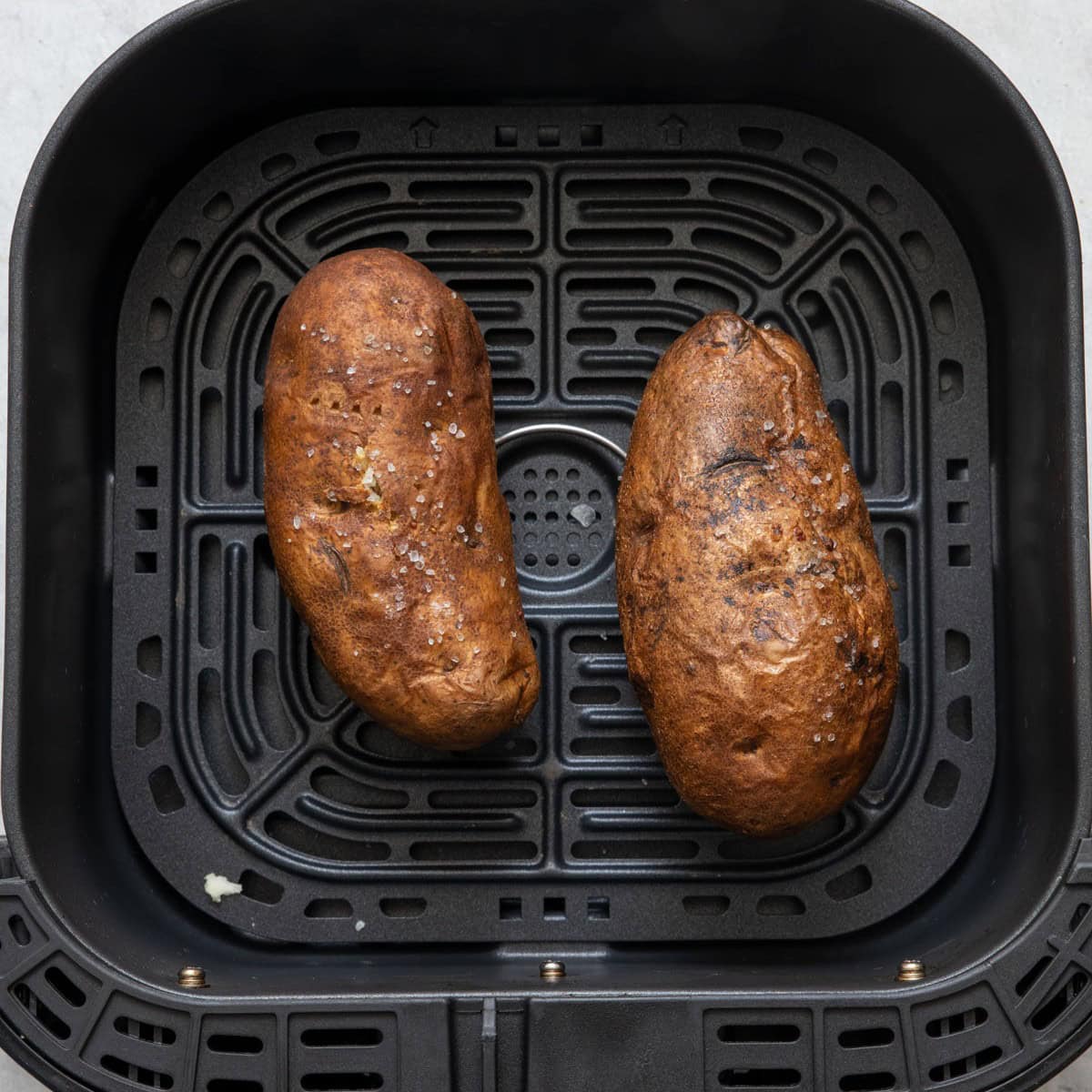 2 potatoes in air fryer after cooked .