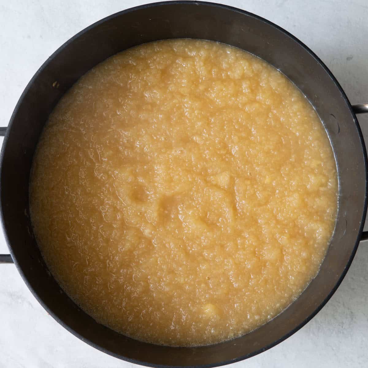 Apples and cider blended back in pot.