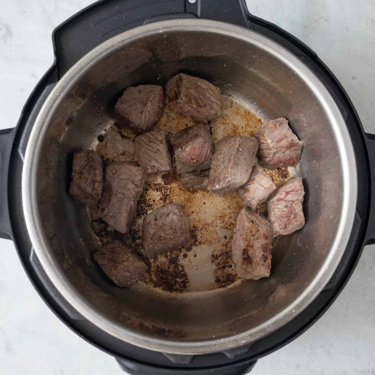Beef sauteed in instant po.