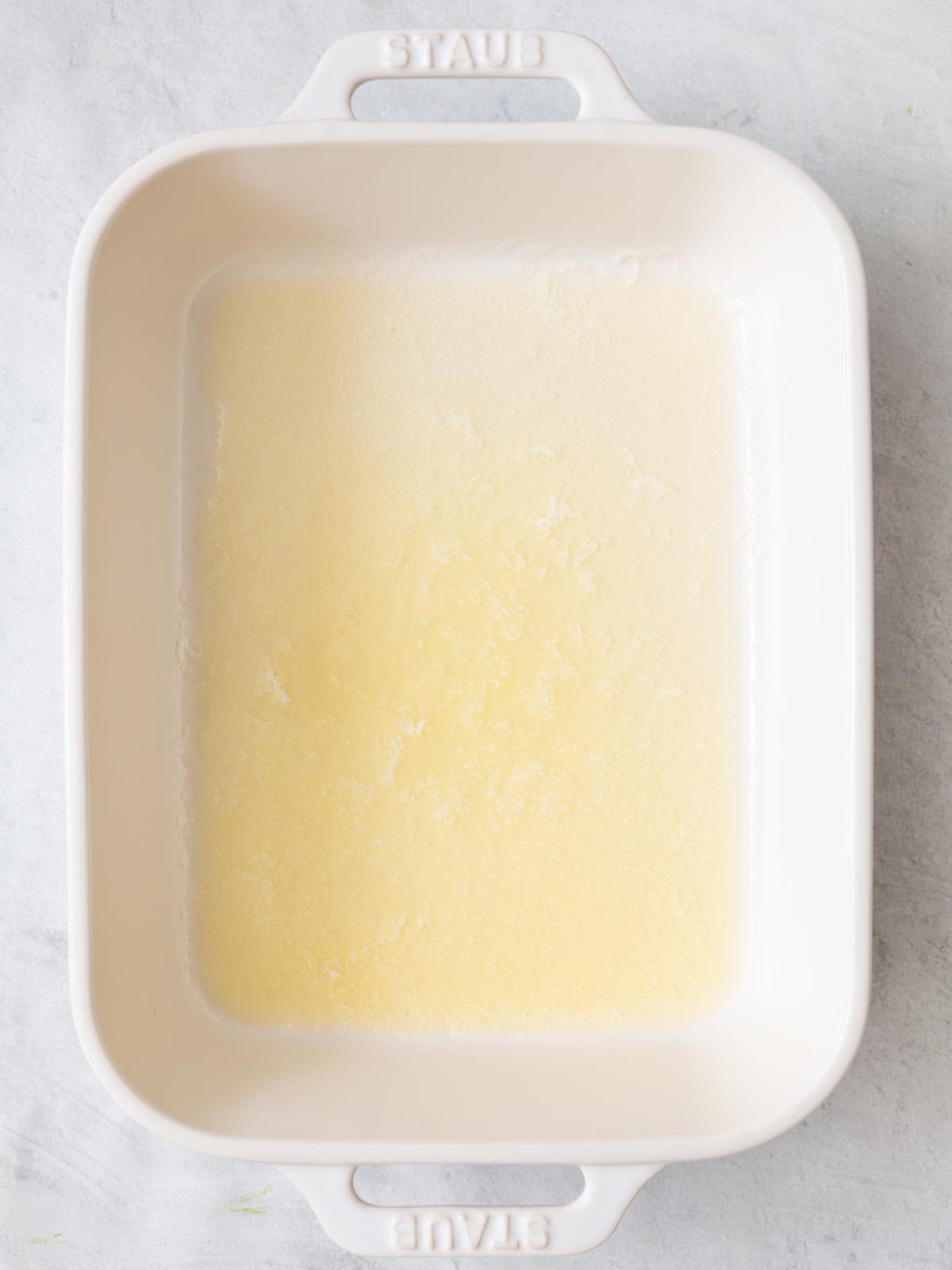 Butter melted in baking dish.
