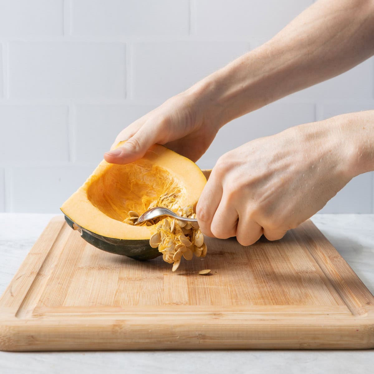 Scooping out seeds.