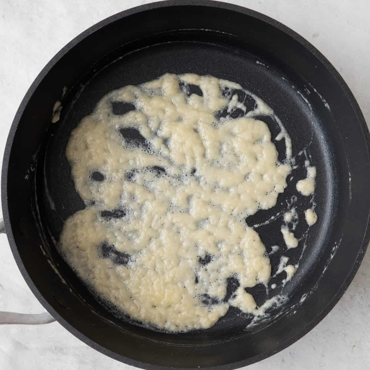 Butter and flour mixed in large saucepan.