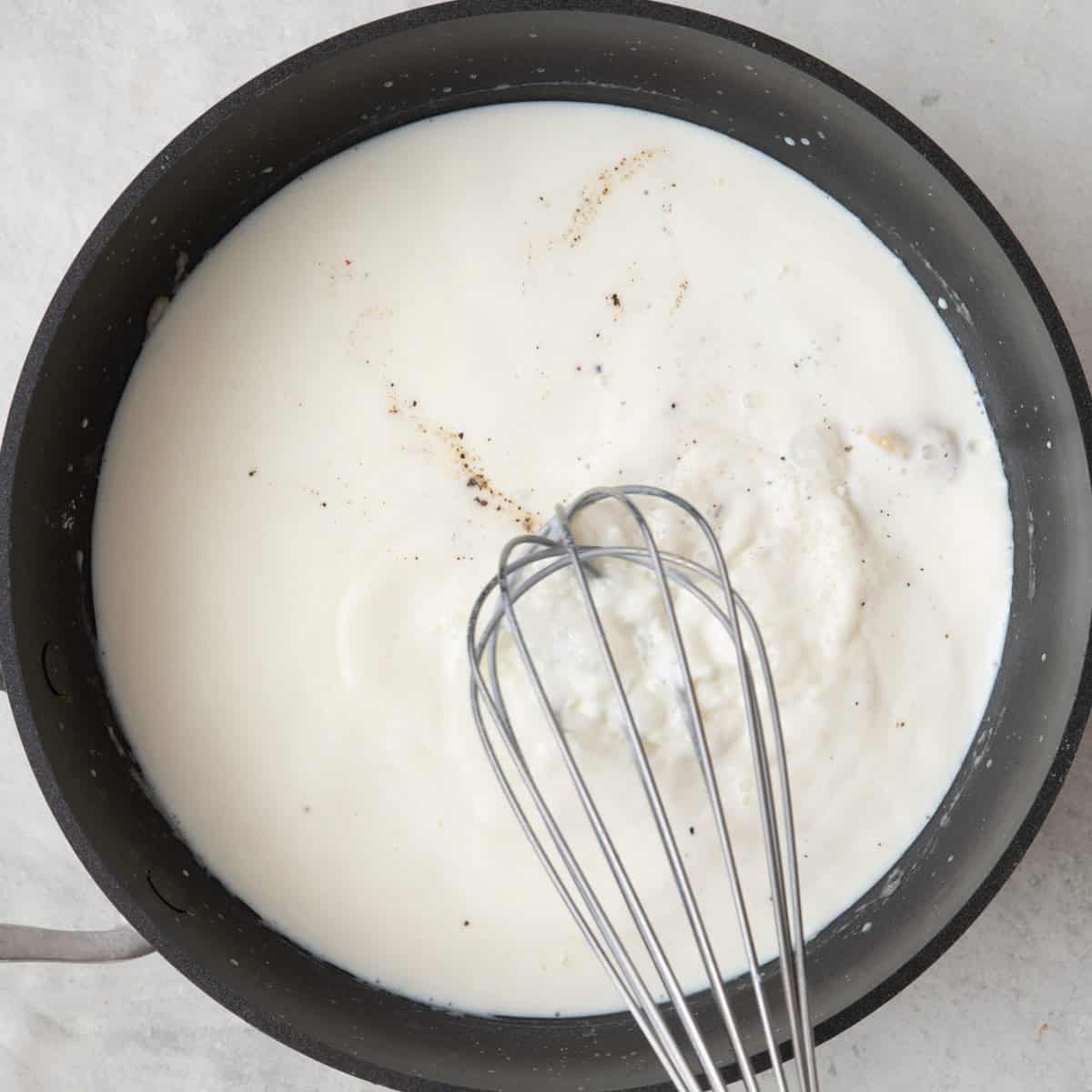 Milk, dijon mustard, and seasoning added.