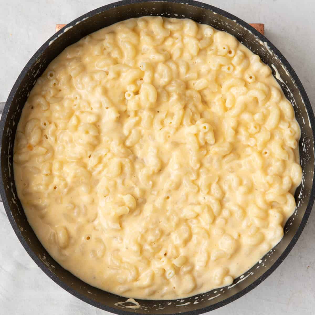 Cheesy sauce and pasta combined.