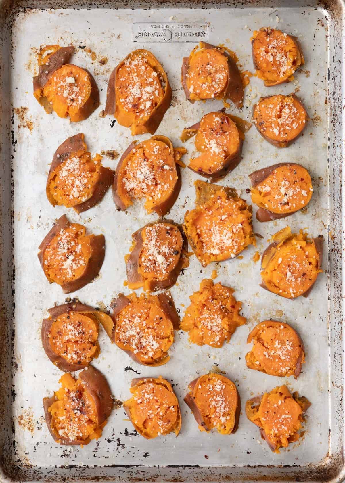 Parmesan cheese sprinkled on top. Smashed sweet potato rounds before baked.