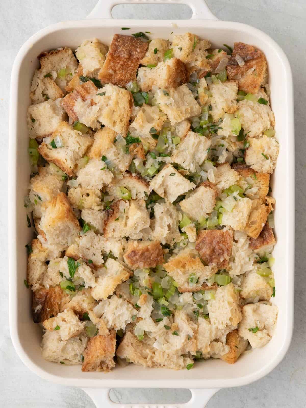 Stuffing in a prepared baking pan before baked.