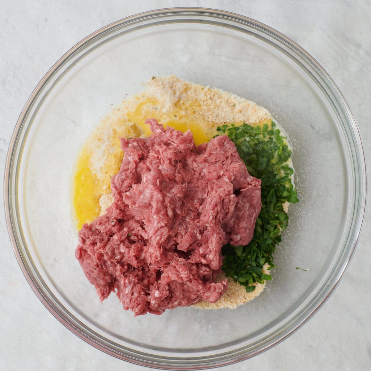 Ground beef added to mixture before combined.