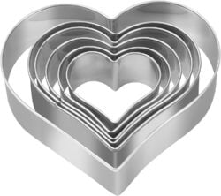 Stack of 6 different sized heart shaped cookie cutters.