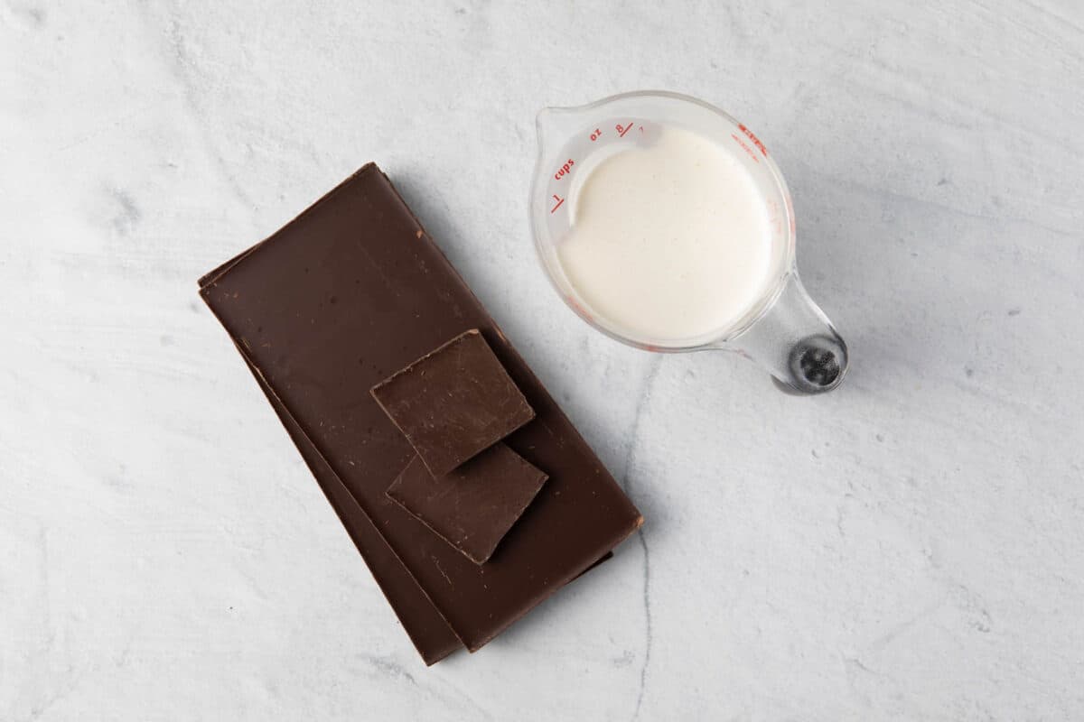 Ingredients for recipe: chocolate bars and heavy cream.