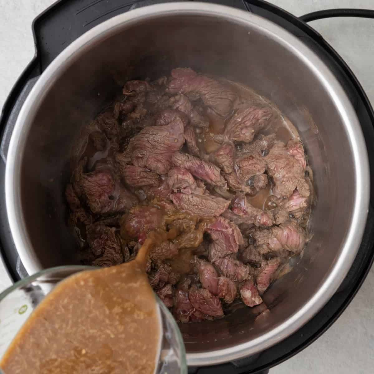 Sauce added to pot.