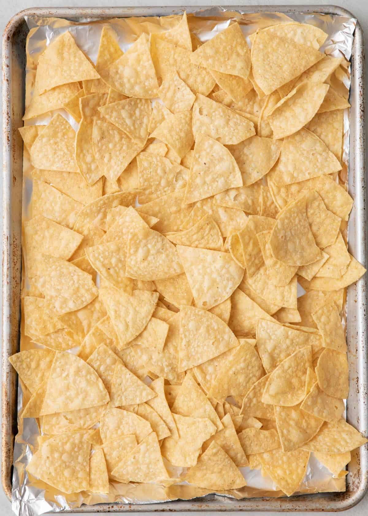 Chips scattered on prepared baking sheet.