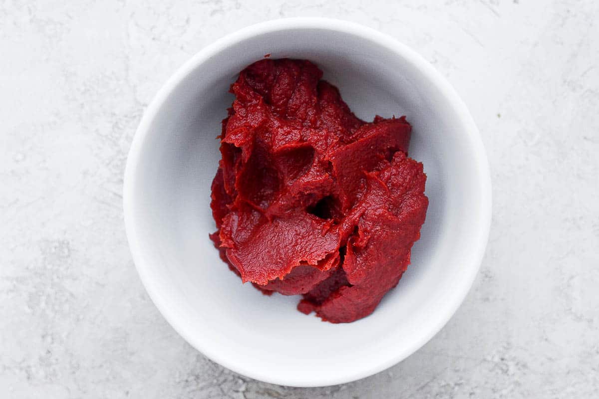 Canned tomato paste in a bowl.