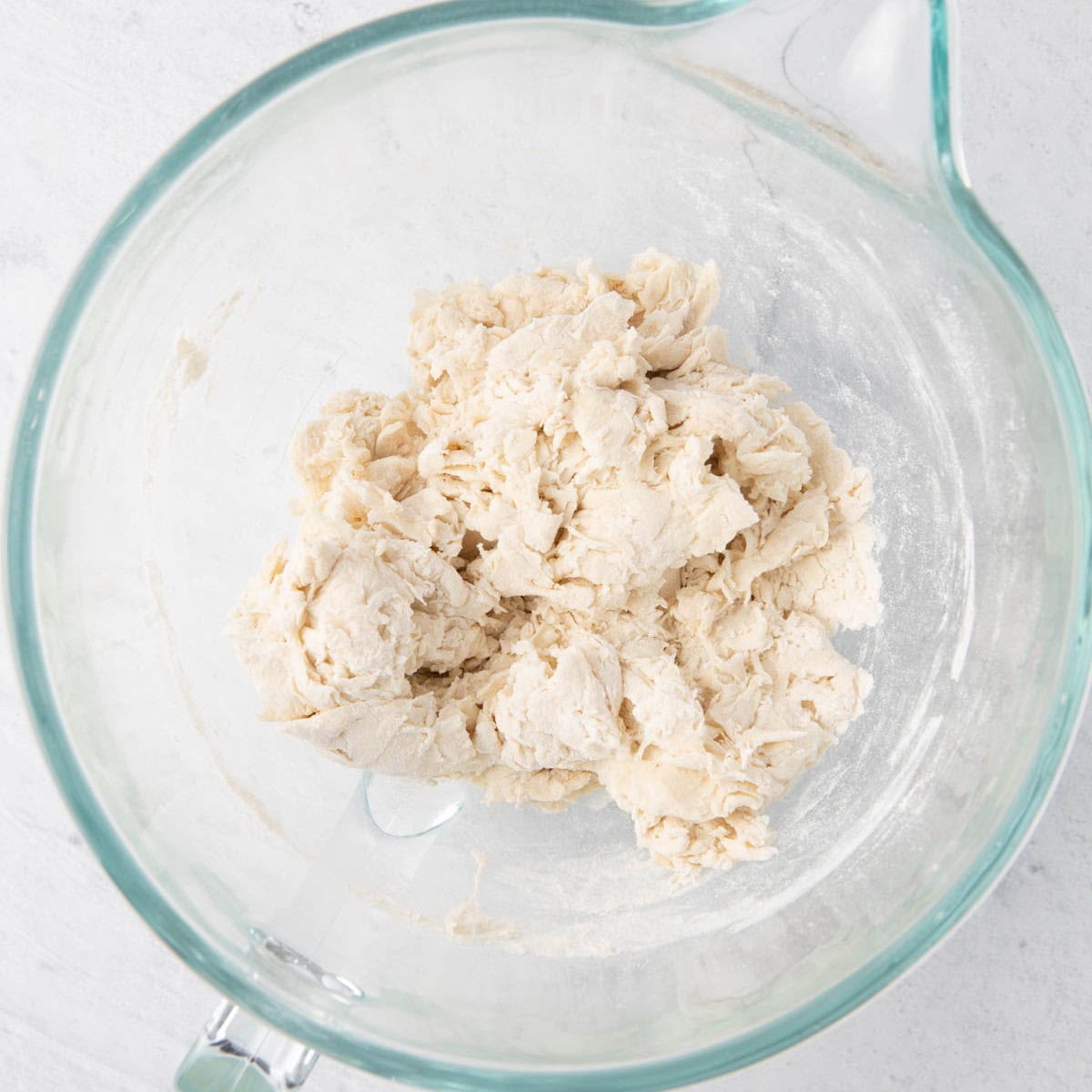 Dough after initial mix to show a shaggy mixture.