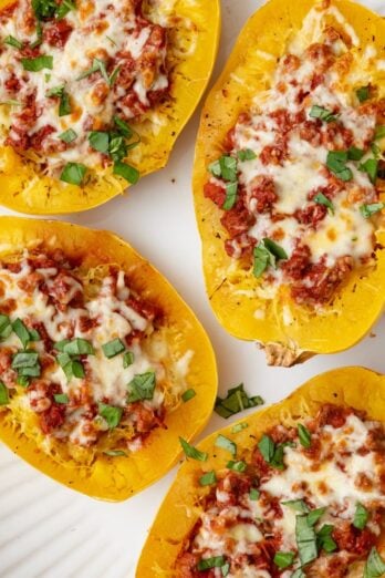 Collage of two images showing spaghetti squash halved before and after removing seeds