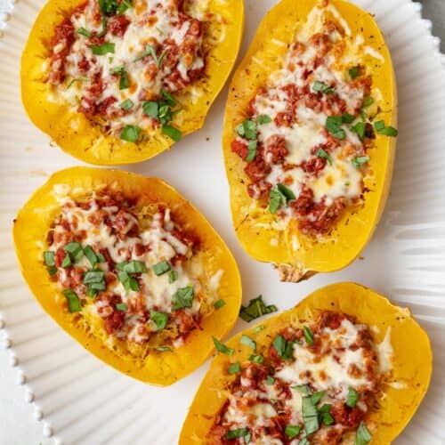 Collage of two images showing spaghetti squash halved before and after removing seeds