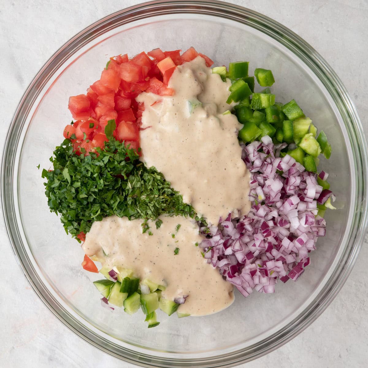 Salad ingredients added before tossed.