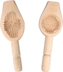 Wooden cookie mold for maamoul cookies with a decorative design.