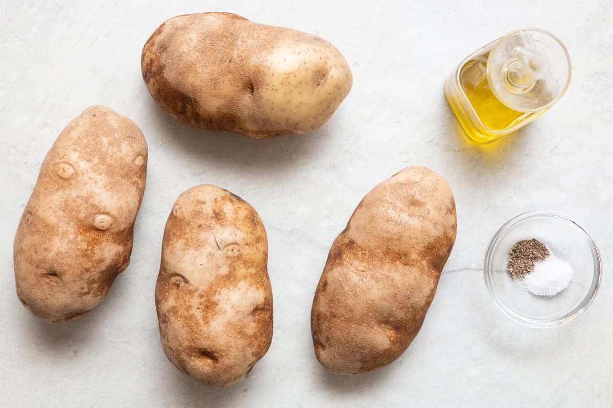 Ingredients for recipe: 4 large baking potatoes, oil, salt and pepper.