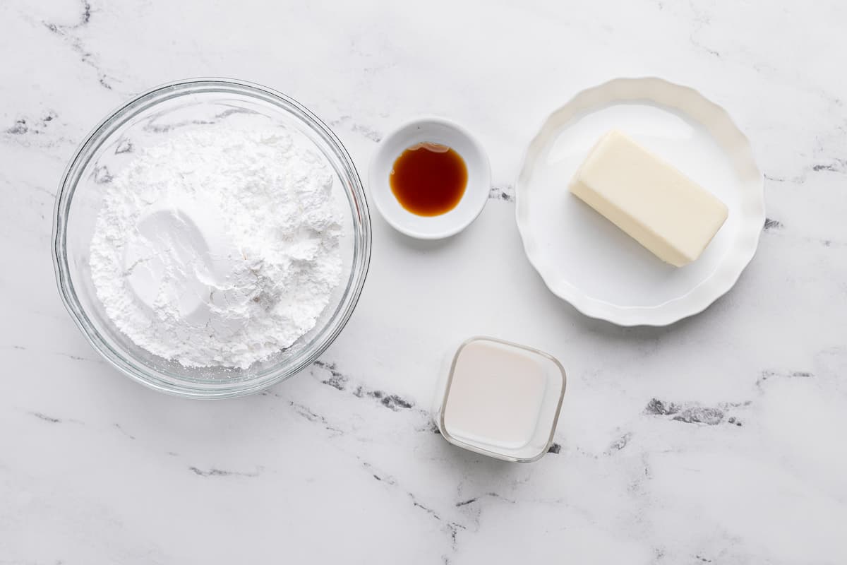 Ingredients for recipe: powdered sugar, vanilla, butter, and milk.