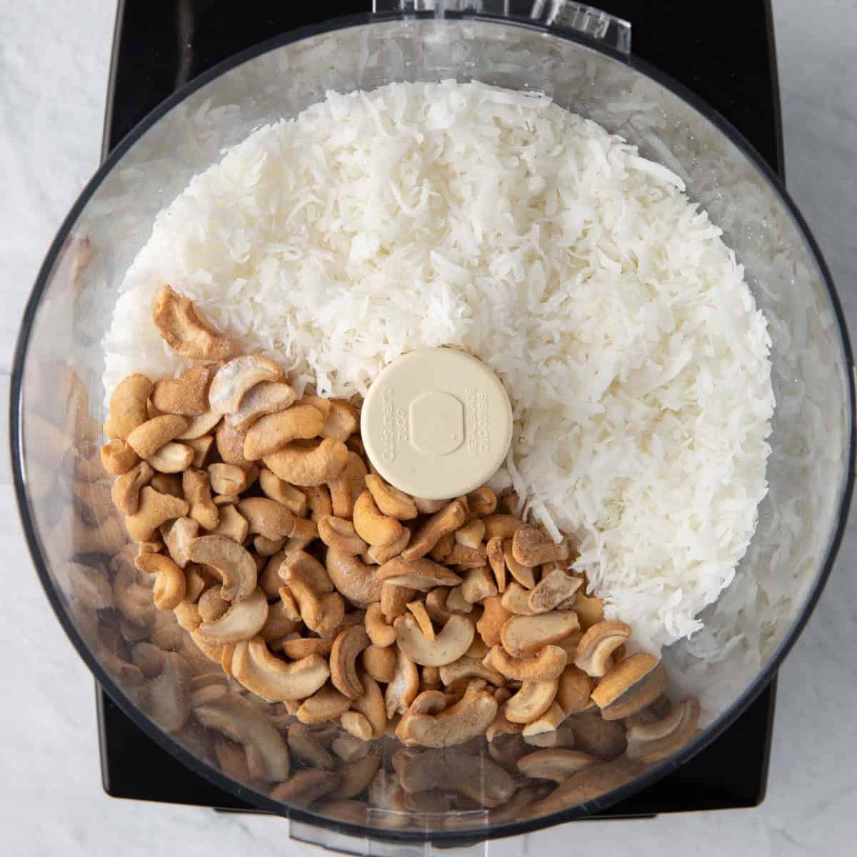 Cashews and coconut before blending in food processor.