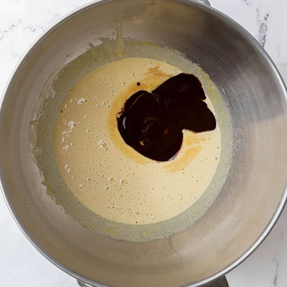 Butter and chocolate mixtures combined in the bowl.