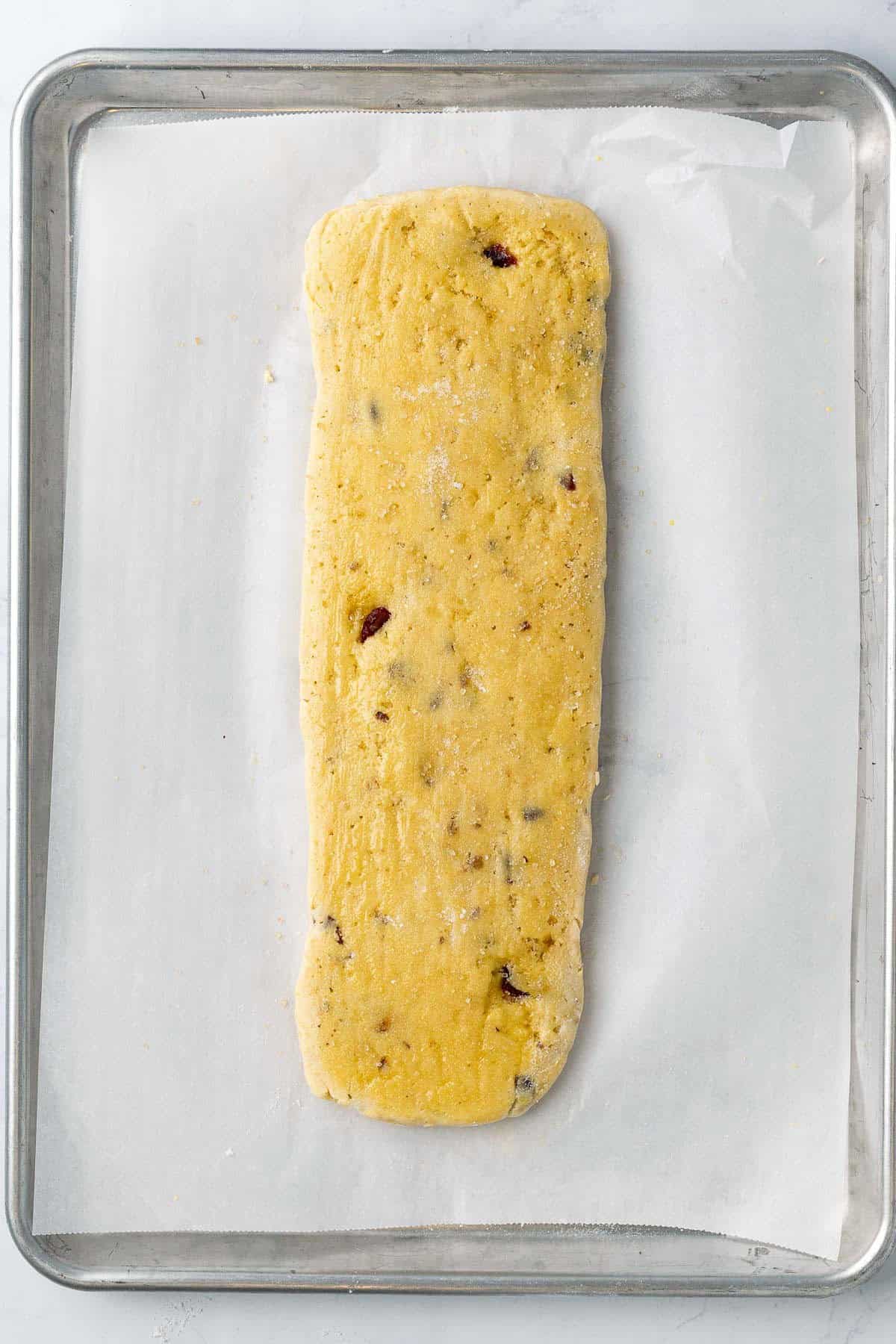 Biscotti before baking egg wash on top and sugar sprinkled on top.