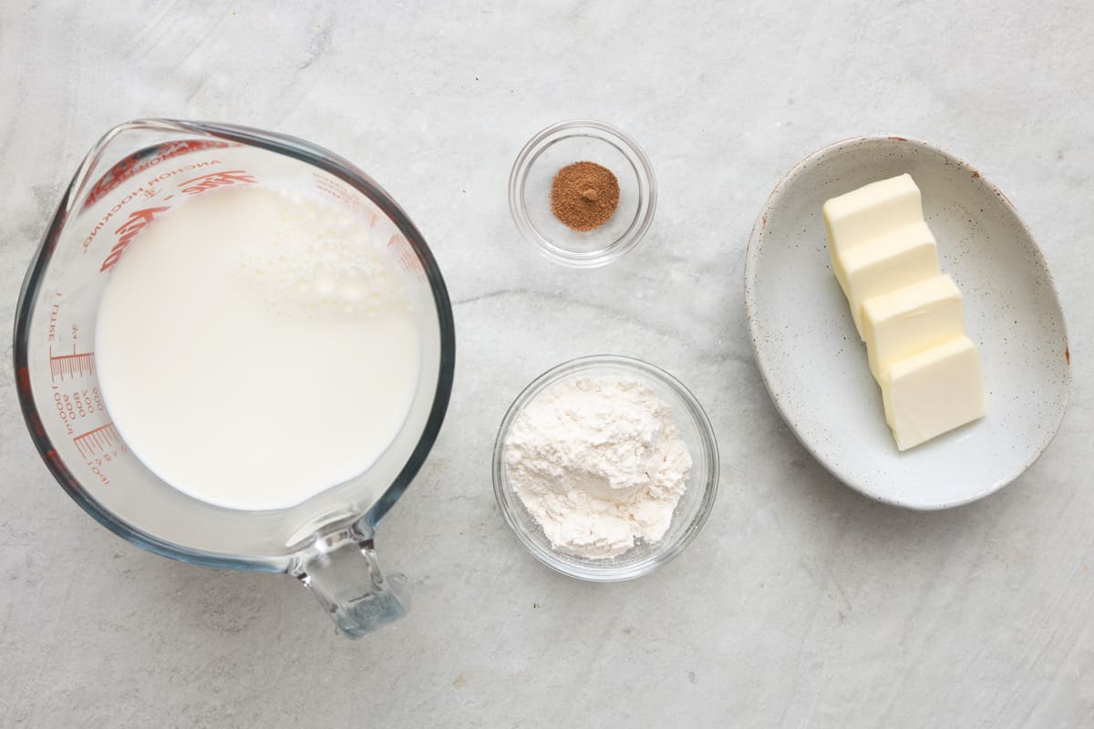 Ingredients for recipe: milk, flour, butter, and nutmeg.