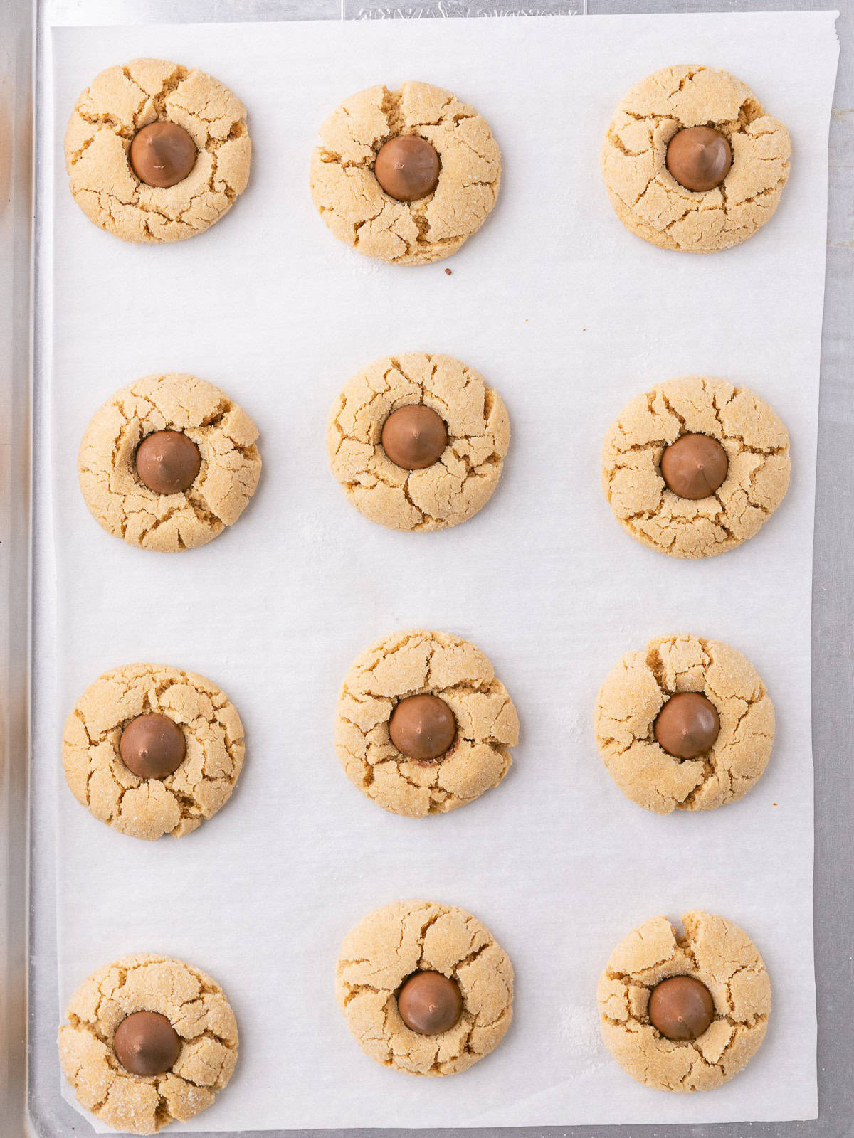 After baking with a hershey kiss added to each cookie.