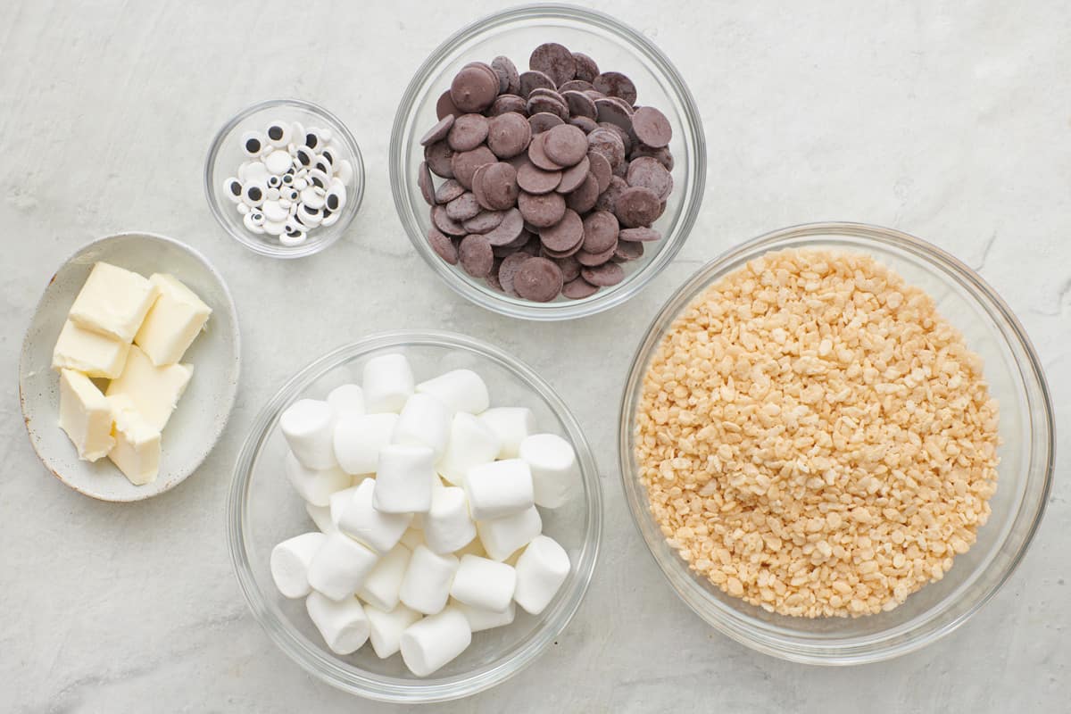 Ingredients for recipe: butter, googly eyes, chocolate wafers, marshmallows, and rice krispies.