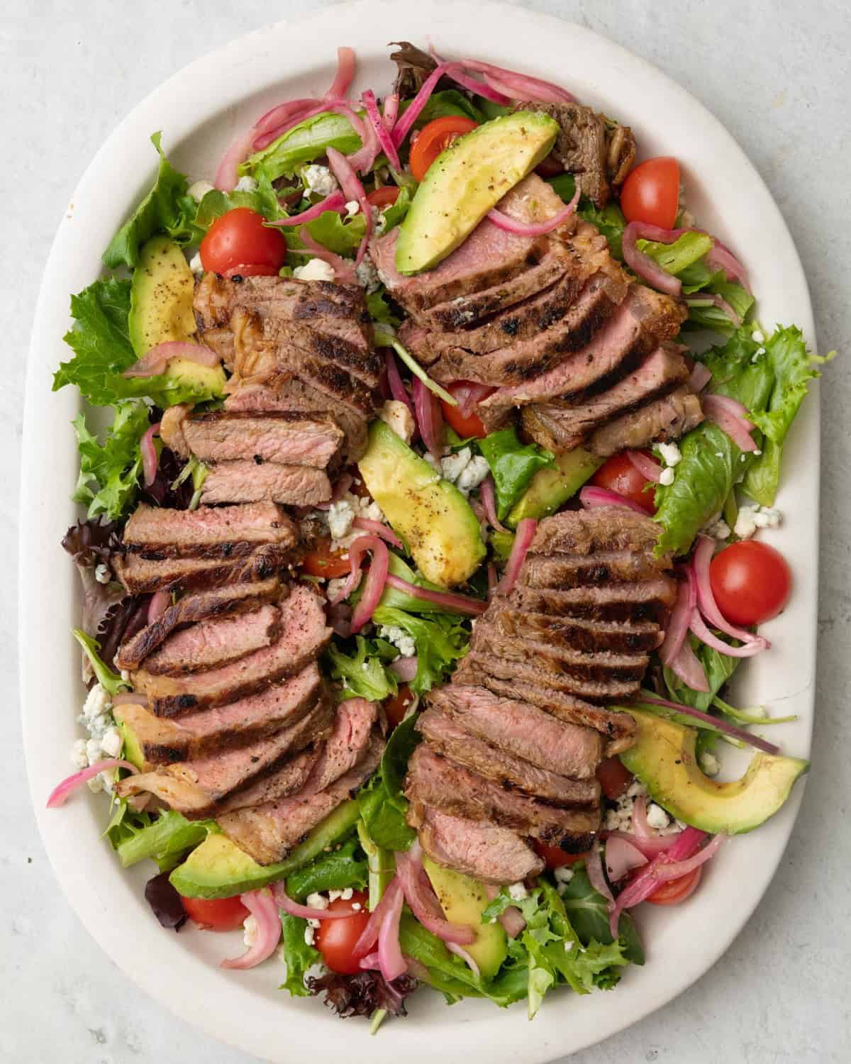 Steak added to the salad.