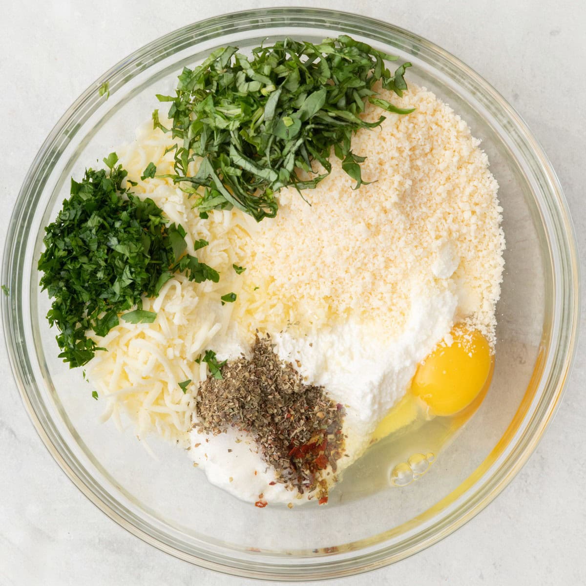 Ricotta mixture ingredients in a bowl before mixing.