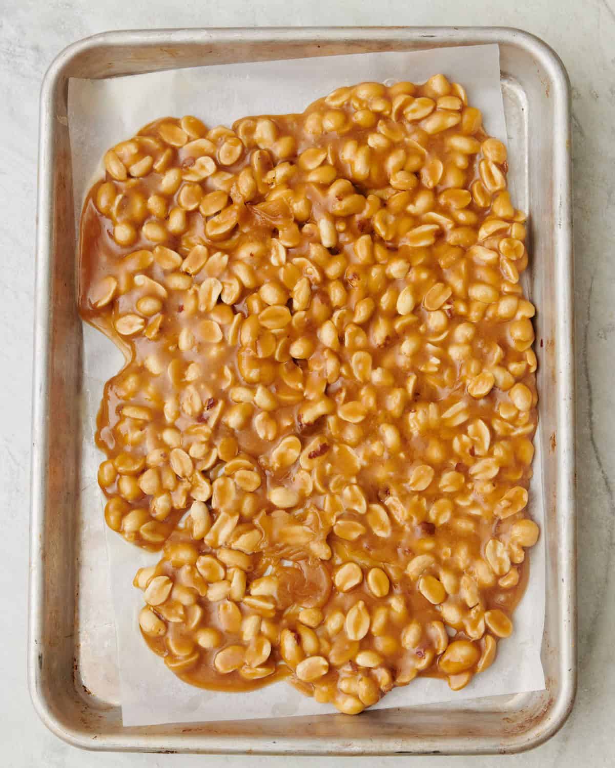 Spreading it evenly.