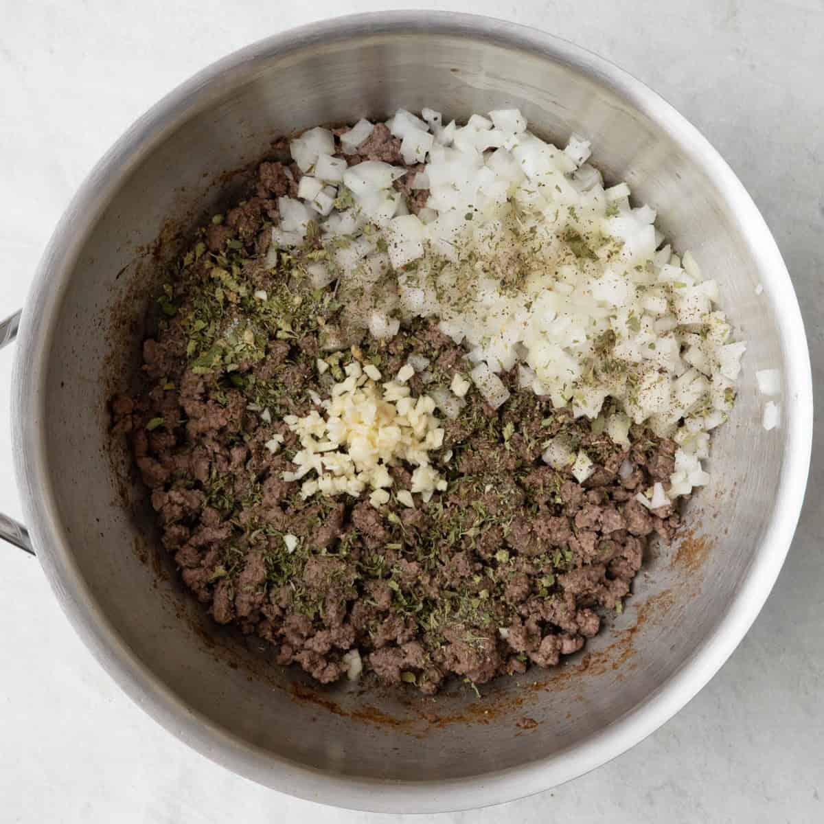 Onions and garlic added.
