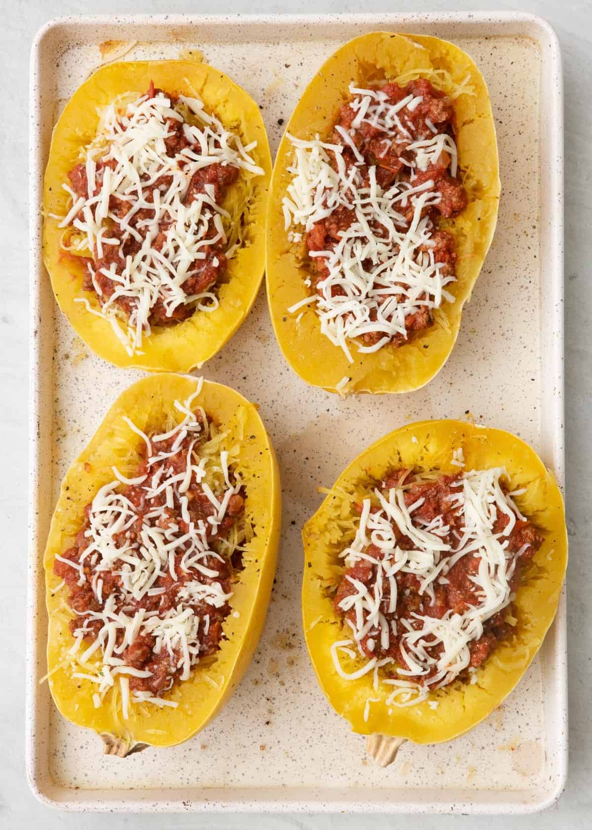 Lasagna with cheese added on top.