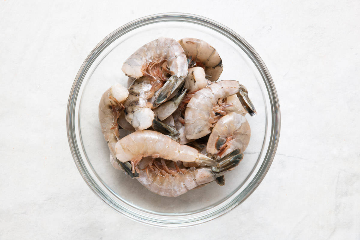Skin on shrimp in a bowl.