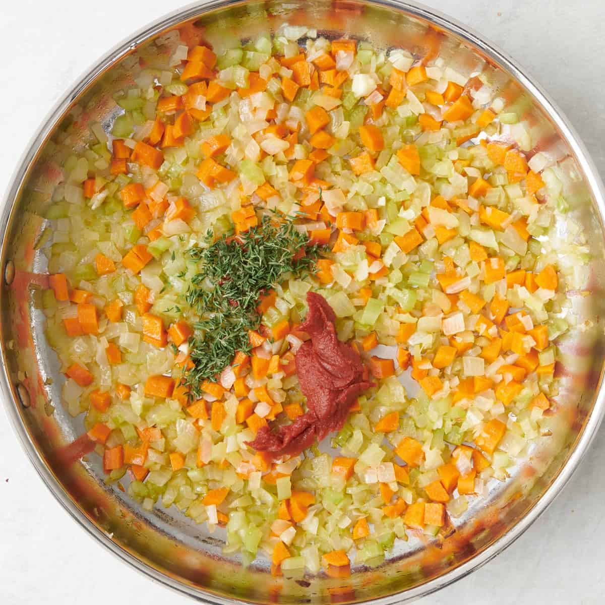 Onion, carrot, and celery in a large skillet with the olive oil.