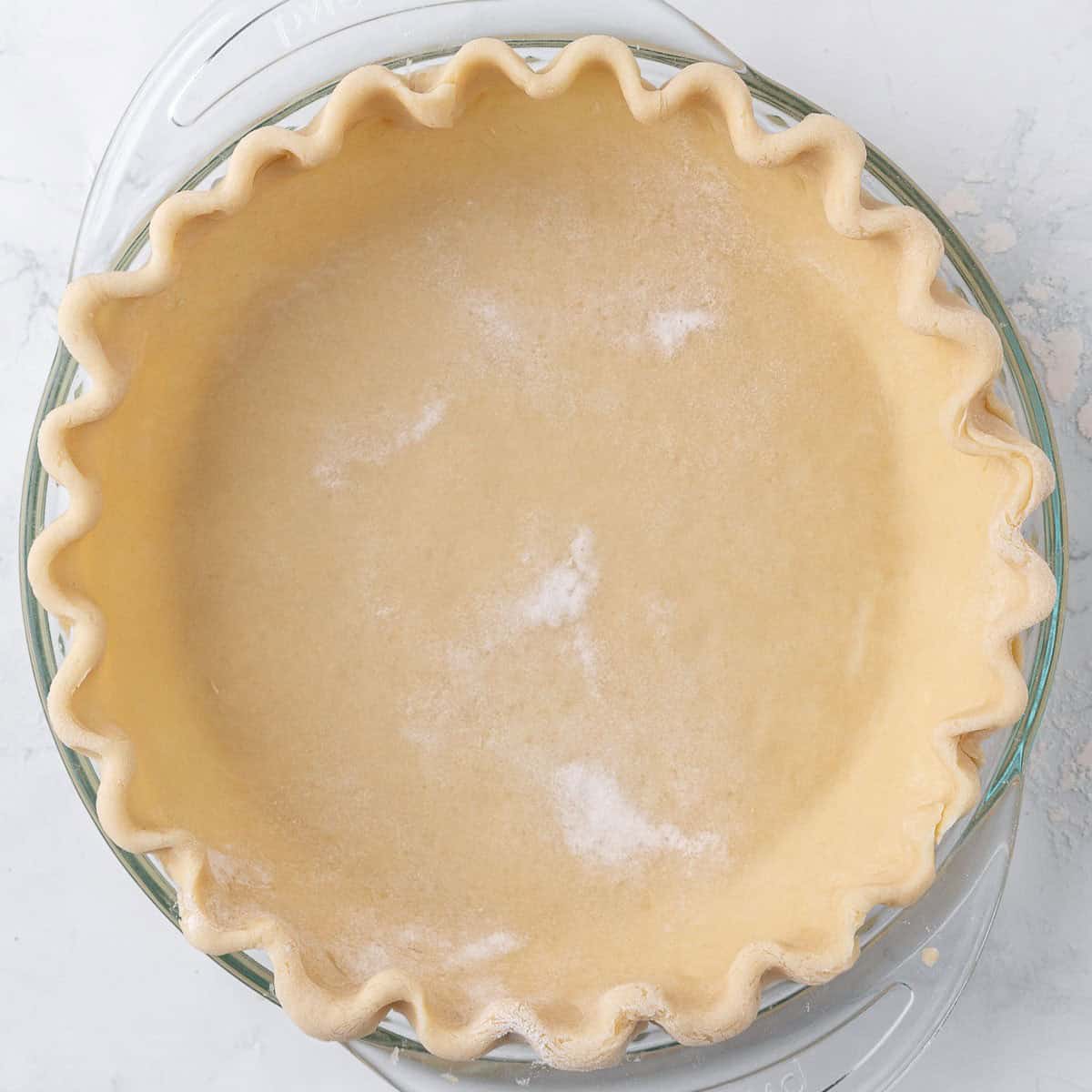 After shaped into pie plate.